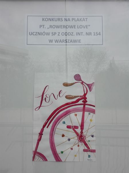 plakat wykonany przez ucznia: napis Love i rysunek roweru